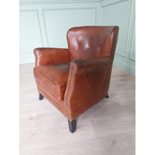 170 - Pair of exceptional quality French hand dyed leather tub chairs with brass studs raised on mahogany ... 