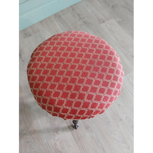 175 - Edwardian mahogany revolving stool with upholstered seat raised on turned legs and ball & claw feet ... 