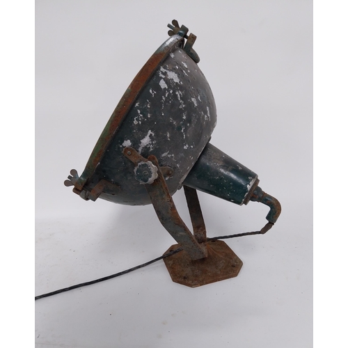 18 - Early 20th C. metal search light on original stand {55 cm H x 48 cm W x 55 cm D}.