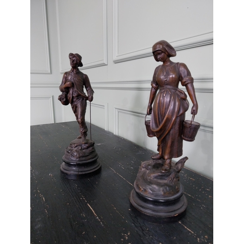 180 - Pair of early 20th C. spelter figures {36 cm H x 13 cm W x 13 cm D}.