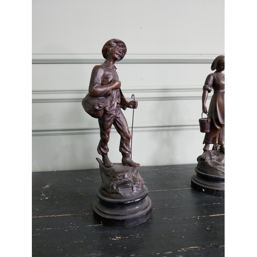 180 - Pair of early 20th C. spelter figures {36 cm H x 13 cm W x 13 cm D}.