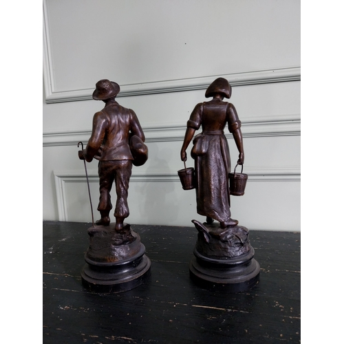 180 - Pair of early 20th C. spelter figures {36 cm H x 13 cm W x 13 cm D}.