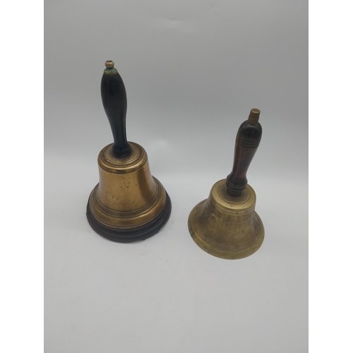 183 - Two good quality brass school bells with rosewood handles {28 cm H and 26 cm H}.