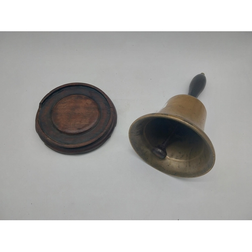 183 - Two good quality brass school bells with rosewood handles {28 cm H and 26 cm H}.