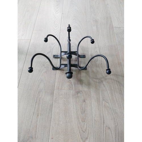 191 - Wrought iron wall mounted hat and coat stand {30 cm H x 35 cm W x 27 cm D}.