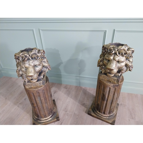 192 - Pair of good quality gilded resin Lions head planters raised on reeded pedestals {110 cm H x 40 cm W... 