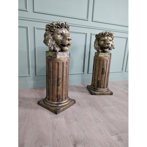 192 - Pair of good quality gilded resin Lions head planters raised on reeded pedestals {110 cm H x 40 cm W... 