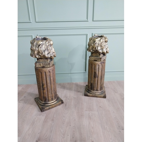 192 - Pair of good quality gilded resin Lions head planters raised on reeded pedestals {110 cm H x 40 cm W... 