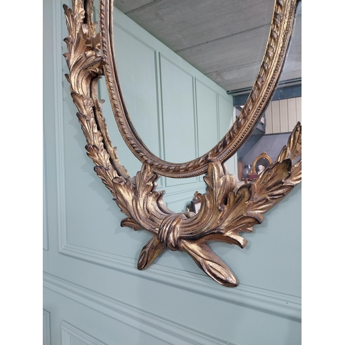 201 - Good quality gilt wall mirror in the Rococo style. {132 cm W x 70 cm W}.