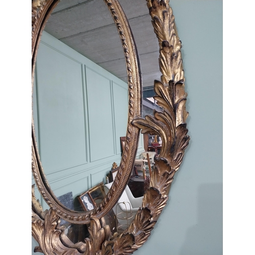 201 - Good quality gilt wall mirror in the Rococo style. {132 cm W x 70 cm W}.