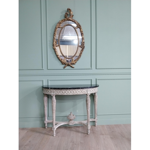 201 - Good quality gilt wall mirror in the Rococo style. {132 cm W x 70 cm W}.