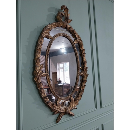 201 - Good quality gilt wall mirror in the Rococo style. {132 cm W x 70 cm W}.