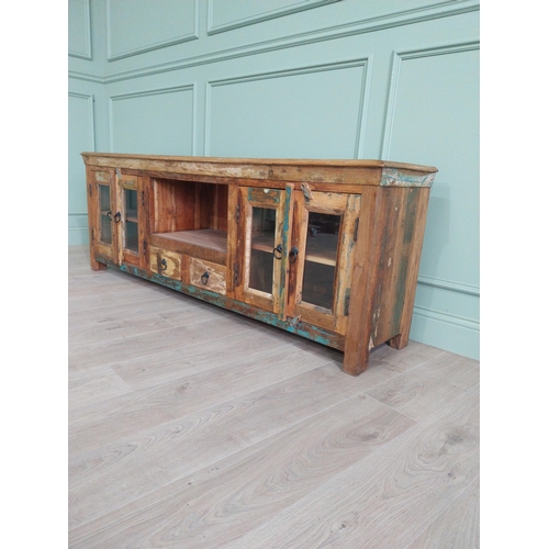 206 - Decorative wooden side cabinet with metal mounts and handles with four glazed doors, two short drawe... 