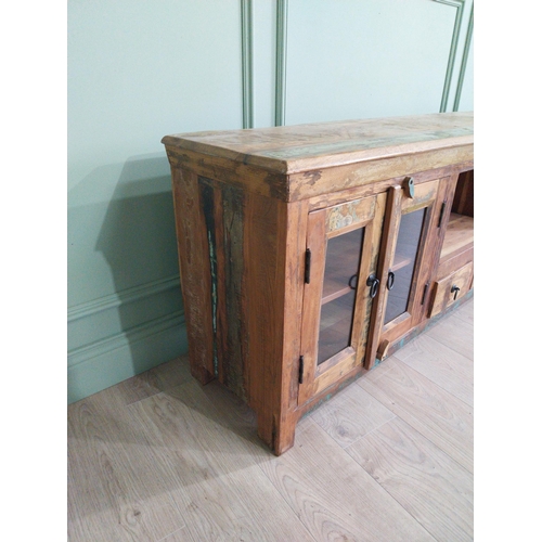 206 - Decorative wooden side cabinet with metal mounts and handles with four glazed doors, two short drawe... 