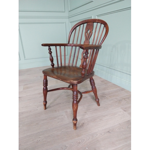 210 - 19th C. ash and elm Windsor armchair {94 cm H x 54 cm W x 57 cm D}.