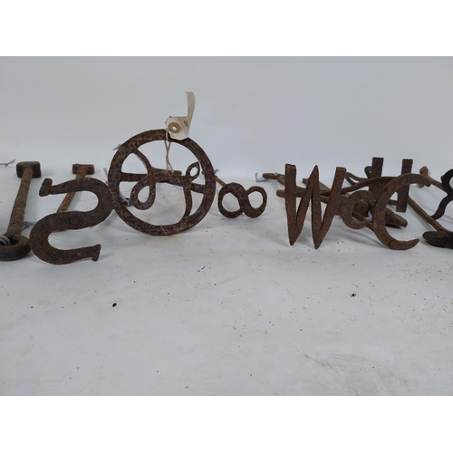 215 - Collection of 19th C. wrought iron branding irons.