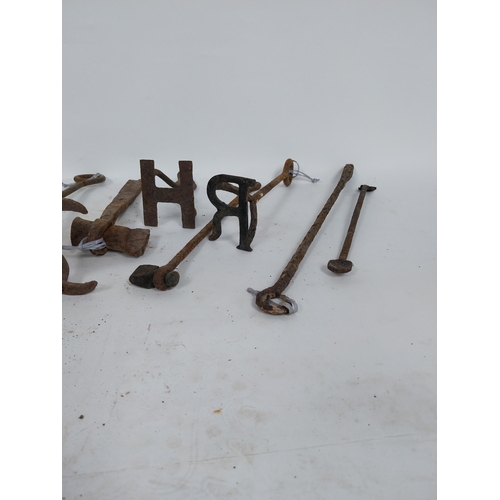 215 - Collection of 19th C. wrought iron branding irons.