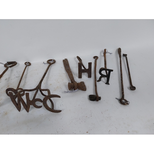 215 - Collection of 19th C. wrought iron branding irons.