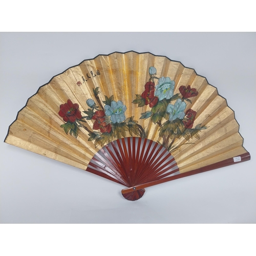 218 - 1950s Oriental gilded fan {60 cm H x 108 cm W}.