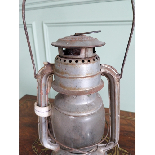 219 - Early 20th C. tinplate hurricane lamp {38 cm H x 19 cm W x 14 cm D}.