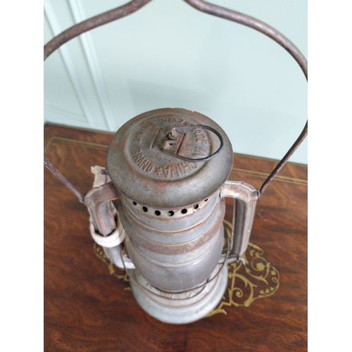 219 - Early 20th C. tinplate hurricane lamp {38 cm H x 19 cm W x 14 cm D}.