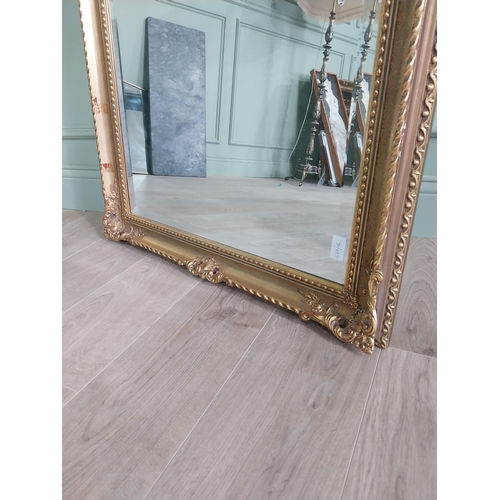 220 - Good quality gilt wall mirror in the Victorian style {139 cm H x 76 cm W}.