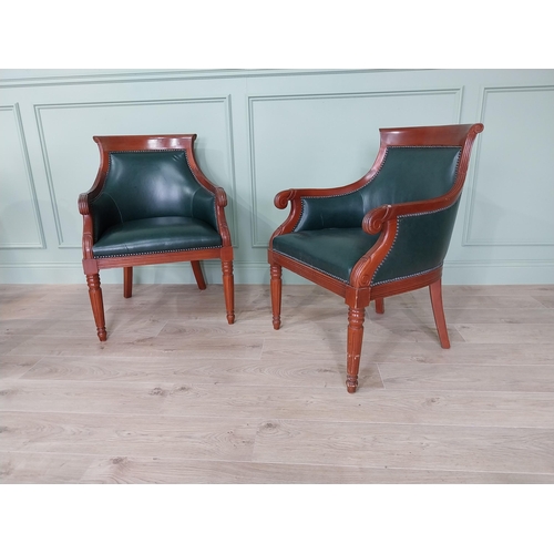 224 - Pair of mahogany and leather upholstered arm chairs in the Regency style {90 cm H x 62 cm W x 65 cm ... 