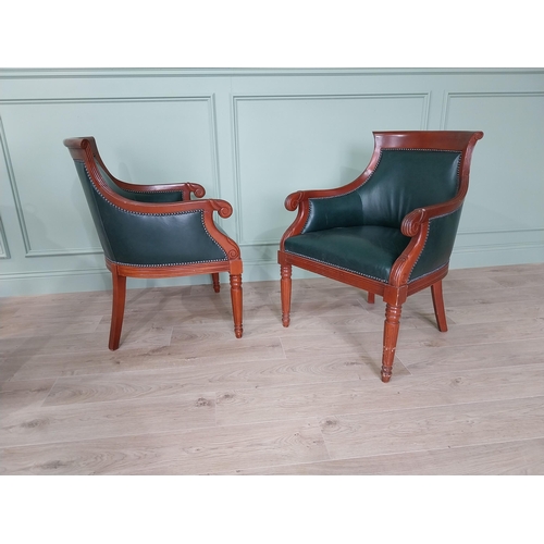 224 - Pair of mahogany and leather upholstered arm chairs in the Regency style {90 cm H x 62 cm W x 65 cm ... 