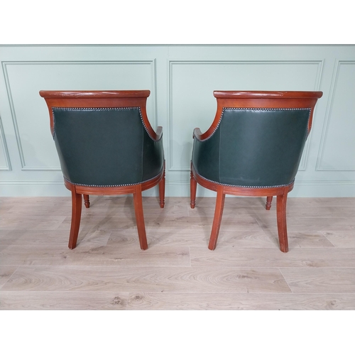 224 - Pair of mahogany and leather upholstered arm chairs in the Regency style {90 cm H x 62 cm W x 65 cm ... 