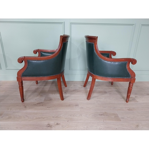 224 - Pair of mahogany and leather upholstered arm chairs in the Regency style {90 cm H x 62 cm W x 65 cm ... 