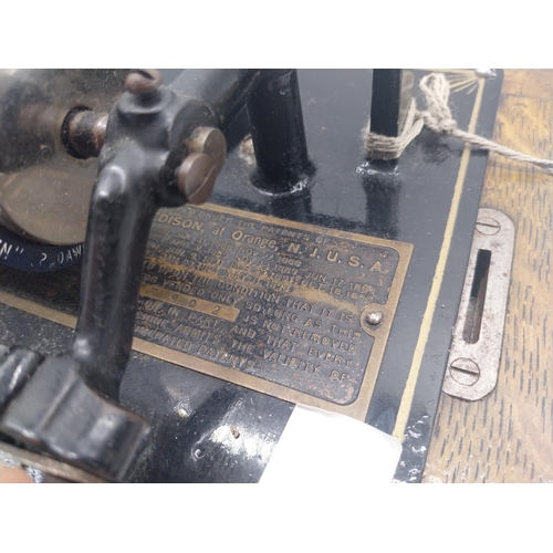 228 - Early 20th C. Edison standard phonograph in oak case with brass horn {55 cm H x 43 cm W x 32 cm D}.