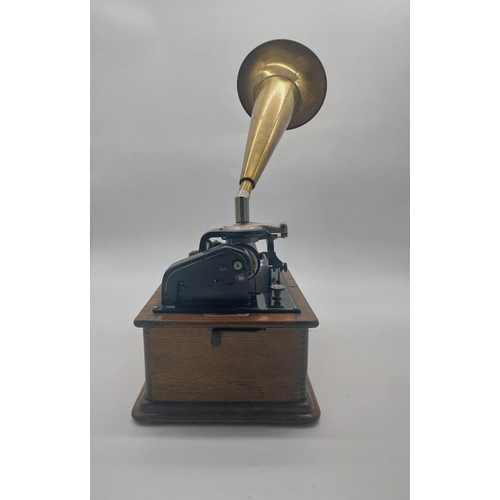 228 - Early 20th C. Edison standard phonograph in oak case with brass horn {55 cm H x 43 cm W x 32 cm D}.