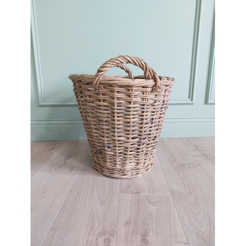 234 - Two early 20th C. wicker baskets {40 cm H x 50 cm W x 48 cm D and 47 cm H x 67 cm W x 54 cm D}.