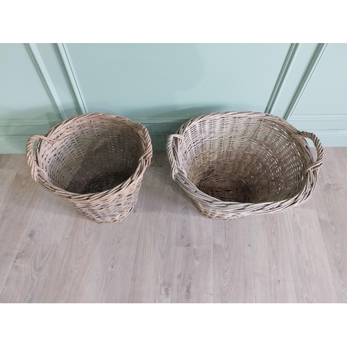 234 - Two early 20th C. wicker baskets {40 cm H x 50 cm W x 48 cm D and 47 cm H x 67 cm W x 54 cm D}.