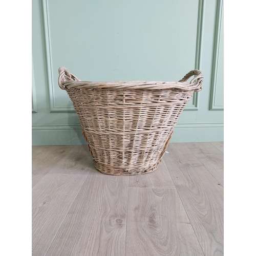 234 - Two early 20th C. wicker baskets {40 cm H x 50 cm W x 48 cm D and 47 cm H x 67 cm W x 54 cm D}.