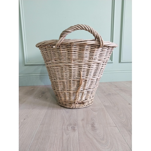 234 - Two early 20th C. wicker baskets {40 cm H x 50 cm W x 48 cm D and 47 cm H x 67 cm W x 54 cm D}.