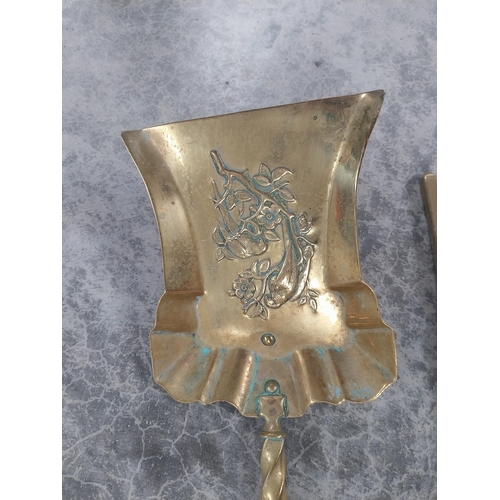 238 - Good quality brass fire companion set in the Victorian style {66 cm H}.