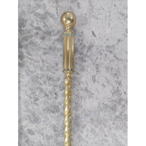 238 - Good quality brass fire companion set in the Victorian style {66 cm H}.
