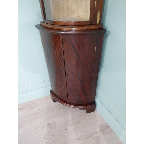 241 - Edwardian mahogany bow fronted corner cabinet with ormolu mounts {170 cm H x 57 cm W x 40 cm D}.