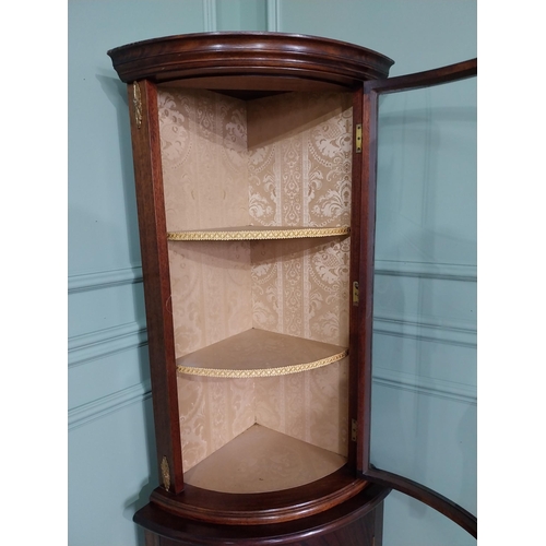 241 - Edwardian mahogany bow fronted corner cabinet with ormolu mounts {170 cm H x 57 cm W x 40 cm D}.