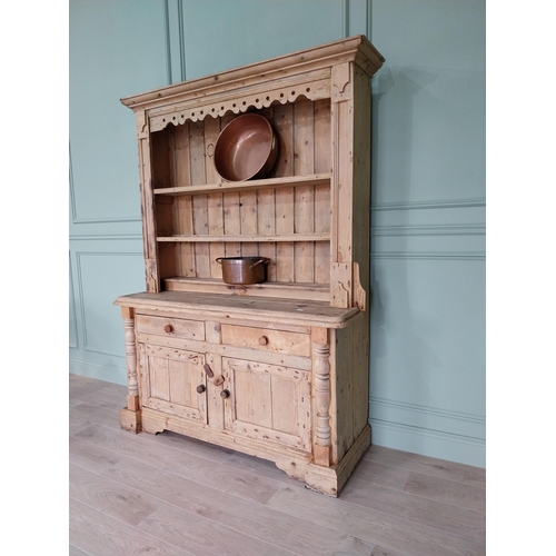 243 - 19th C. Irish pine dresser, the superstructure with two shelves and a half shelf above the bread boa... 