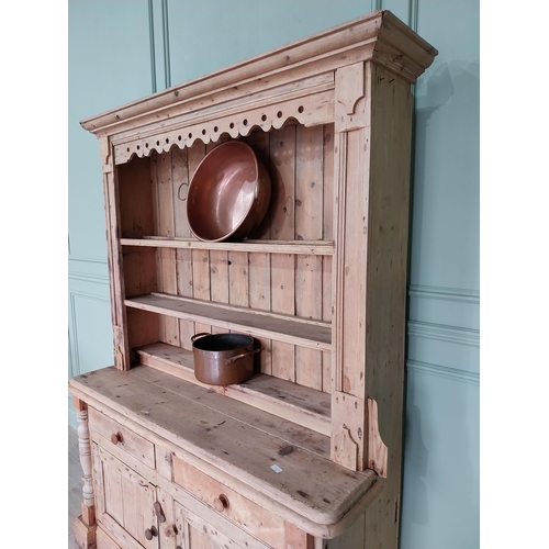 243 - 19th C. Irish pine dresser, the superstructure with two shelves and a half shelf above the bread boa... 