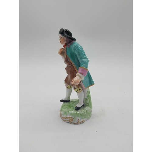 249 - Three decorative hand painted porcelain figures {27 cm H x 13 cm W x 10 cm D and 17 cm H x 7 cm W x ... 