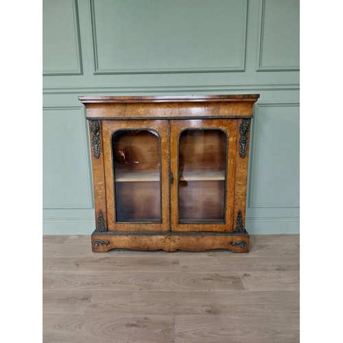 25 - Good quality 19th C. French walnut side cabinet with two glazed doors and ormolu mounts {112 cm H x ... 