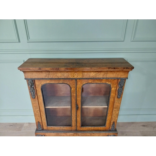 25 - Good quality 19th C. French walnut side cabinet with two glazed doors and ormolu mounts {112 cm H x ... 