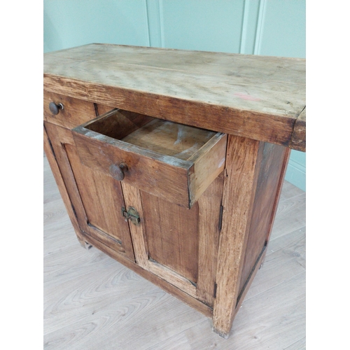 268 - Early 20th C. oak and pine cupboard with two long doors over two short drawers on square feet. {80 c... 
