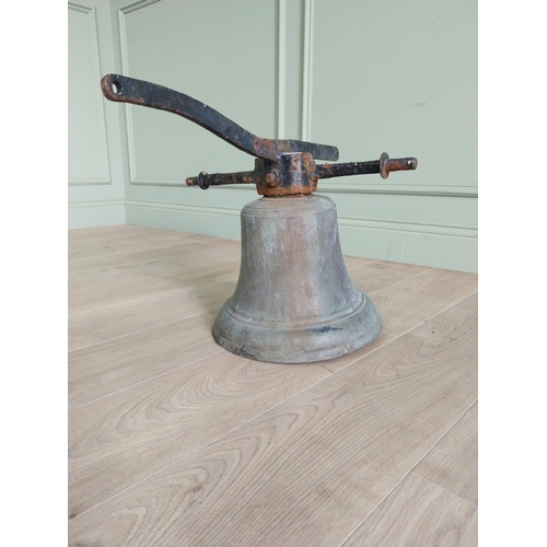 27 - Good quality 19th C. bronze bell with original wrought iron hanger {37 cm H x 34 cm W x 58 cm D}.