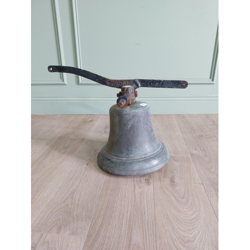 27 - Good quality 19th C. bronze bell with original wrought iron hanger {37 cm H x 34 cm W x 58 cm D}.