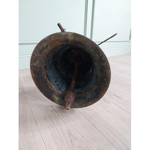 27 - Good quality 19th C. bronze bell with original wrought iron hanger {37 cm H x 34 cm W x 58 cm D}.