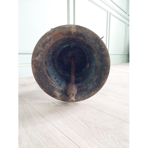 27 - Good quality 19th C. bronze bell with original wrought iron hanger {37 cm H x 34 cm W x 58 cm D}.